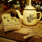Yoke The' ရုပ်သေးဖန်ချိုလက်ဖက်ရည်